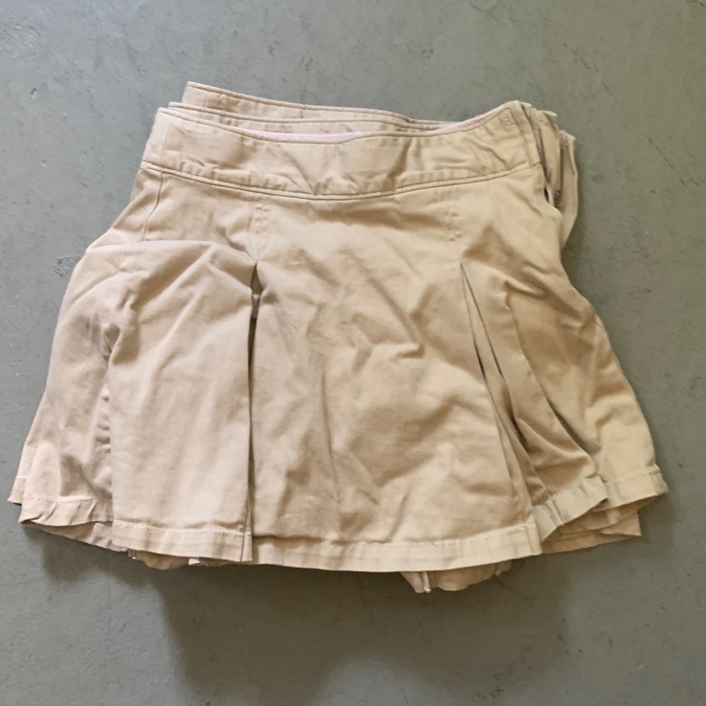 Three uniform skirts sized 10